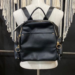 Cute, medium size backpack with gold hardware